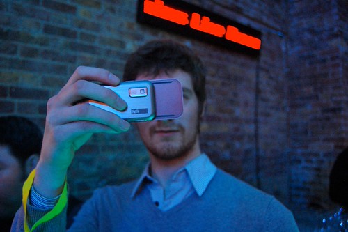Dan plays with the INQ-1 (aka the FacebookPhone)